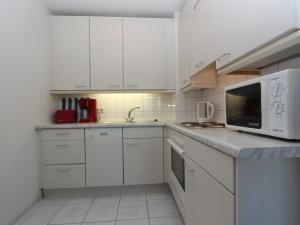 Η κουζίνα ή μικρή κουζίνα στο Fewo 11 Schekahn Am Achterwasser Zempin - Fewo cc