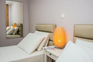 A bed or beds in a room at Elena's apartment 3