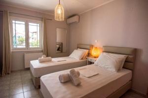 A bed or beds in a room at Elena's apartment 3