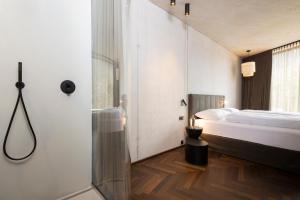 Postel nebo postele na pokoji v ubytování Lifestyle B&B by Phillip Sigwart
