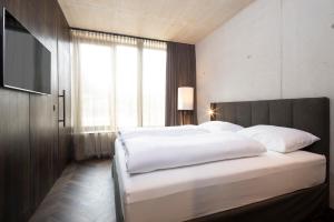 Postel nebo postele na pokoji v ubytování Lifestyle B&B by Phillip Sigwart