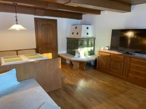A kitchen or kitchenette at FerienWohnung Weer