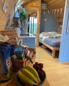 Garden Cottage Glamping Pod客房内的一张或多张床位