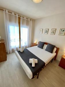 Posteľ alebo postele v izbe v ubytovaní For a Stay Eden Mar