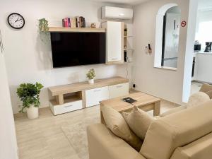 Televízia a/alebo spoločenská miestnosť v ubytovaní Ático con terraza centro de Tarragona, Mi Refugio
