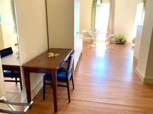 a room with a table and chairs and a dining room at HOTEL DEL GOLFO in Finale Ligure