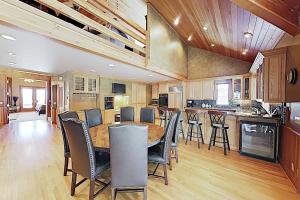 a kitchen and dining room with a table and chairs at Golden Eagle Dreams in Park City