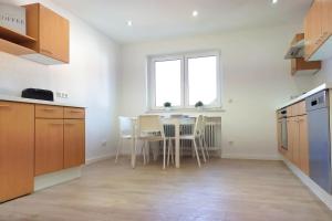 Kuchyň nebo kuchyňský kout v ubytování Holiday Apartments Brachttal + 16 fotografií