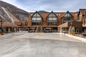 an empty ice rink in front of a building at Lowell Haven 267 in Park City