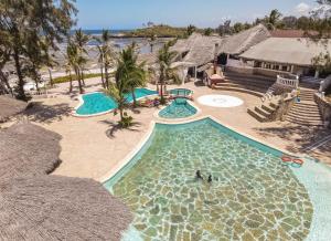 an overhead view of a swimming pool at a resort at Lily Palm Resort in Watamu