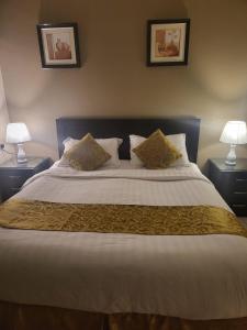 Ένα ή περισσότερα κρεβάτια σε δωμάτιο στο Safwt Aldyar Furnished Units