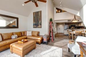 a living room with a couch and a table at Mountain Village Lodge 351 in Park City