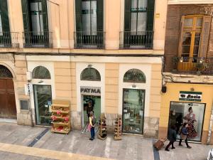 Hostia v ubytovaní Homely Málaga Loft Especerías
