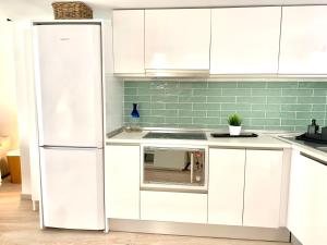 Kuchyňa alebo kuchynka v ubytovaní Homely Málaga Loft Especerías