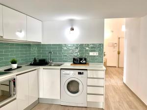 Kuchyňa alebo kuchynka v ubytovaní Homely Málaga Loft Especerías