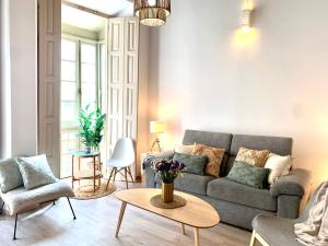 Posedenie v ubytovaní Homely Málaga Loft Especerías
