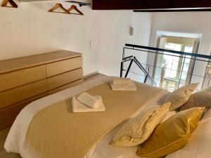 Posteľ alebo postele v izbe v ubytovaní Homely Málaga Loft Especerías