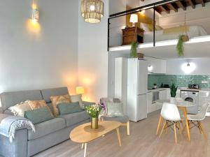 Posedenie v ubytovaní Homely Málaga Loft Especerías