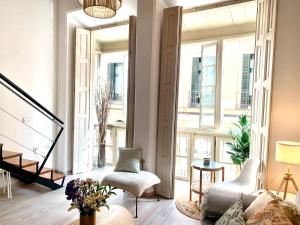 Posedenie v ubytovaní Homely Málaga Loft Especerías