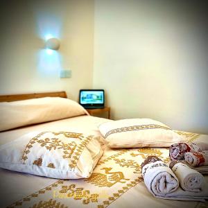 Postelja oz. postelje v sobi nastanitve B&B Le pavoncelle sarde + 37 fotografij