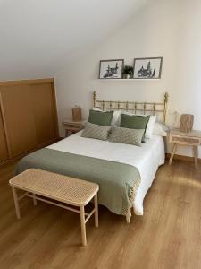 Кровать или кровати в номере O Pequeno Rincón
