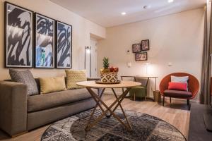 Posezení v ubytování Suites Murillo Plaza Sta. Cruz