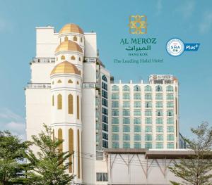 a large white building with a clock tower at Al Meroz Hotel Bangkok - The Leading Halal Hotel in Bangkok