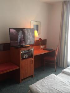 Postel nebo postele na pokoji v ubytování Alexander am Zoo