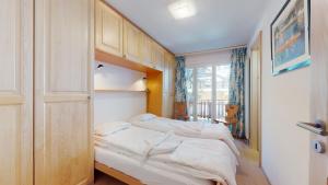 Postel nebo postele na pokoji v ubytování Hortensia H 023 - VIEW & MOUNTAIN apartment 6 pers