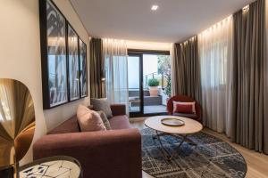 Posezení v ubytování Suites Murillo Plaza Sta. Cruz