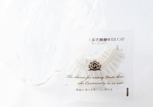 a picture of a certificate with a ring on it at APA Hotel Nambaminami Ebisucho Eki Shinsekai in Osaka