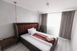 Llit o llits en una habitació de Bear's Apartment 2 Alba Iulia