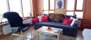 Posezení v ubytování Kópareykir Cottage