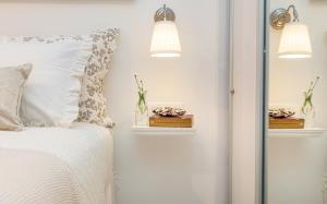 Postel nebo postele na pokoji v ubytování Perfect Downtown Apartment A217
