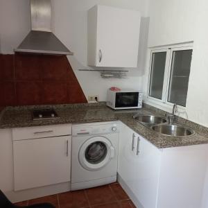 A kitchen or kitchenette at GABISOL Apartments 2