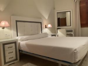 Postel nebo postele na pokoji v ubytování Hotel el Sol