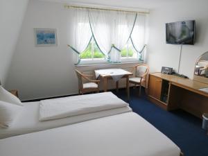 Voodi või voodid majutusasutuse Hotel Retterath am Nürburgring toas