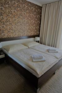 Postel nebo postele na pokoji v ubytování Penzión Villa