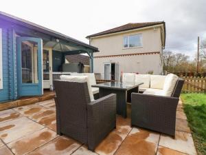 Posezení v ubytování Aditum Cottage