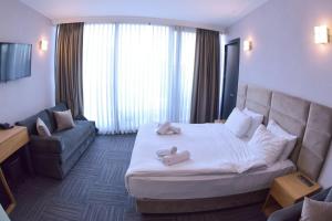 Postel nebo postele na pokoji v ubytování Taksim Hotel V Plus