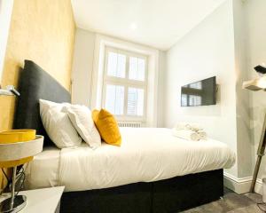 Et tv og/eller underholdning på Gorgeous 2BR & Central Edinburgh Bolt-hole