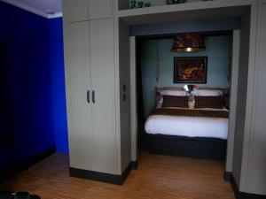 Postel nebo postele na pokoji v ubytování Suite 24