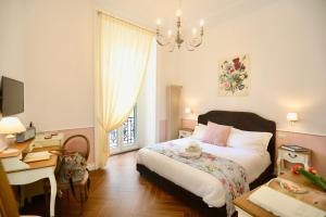 Postel nebo postele na pokoji v ubytování Macchiato Suites Boutique Guest House