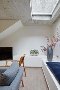 Televízia a/alebo spoločenská miestnosť v ubytovaní Villa Loretopea by FeelFree Rentals