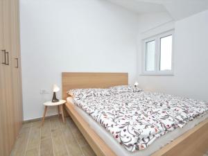 Postel nebo postele na pokoji v ubytování Apartment Anna-2 by Interhome