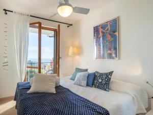 Ένα ή περισσότερα κρεβάτια σε δωμάτιο στο Apartment International by Interhome