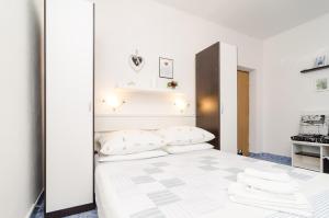 Postel nebo postele na pokoji v ubytování Apartments Vera