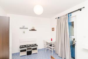 Kuchyň nebo kuchyňský kout v ubytování Apartments Vera
