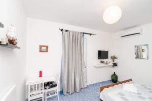 Postel nebo postele na pokoji v ubytování Apartments Vera