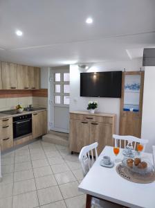 A kitchen or kitchenette at STONE HOUSE Lovric
